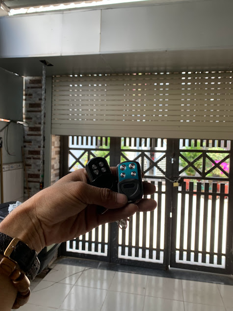 Làm remote cửa cuốn mới tại nhà TP.HCM – sao chép remote cửa cuốn Austdoor, Mitadoor, BossDoor chính hãng